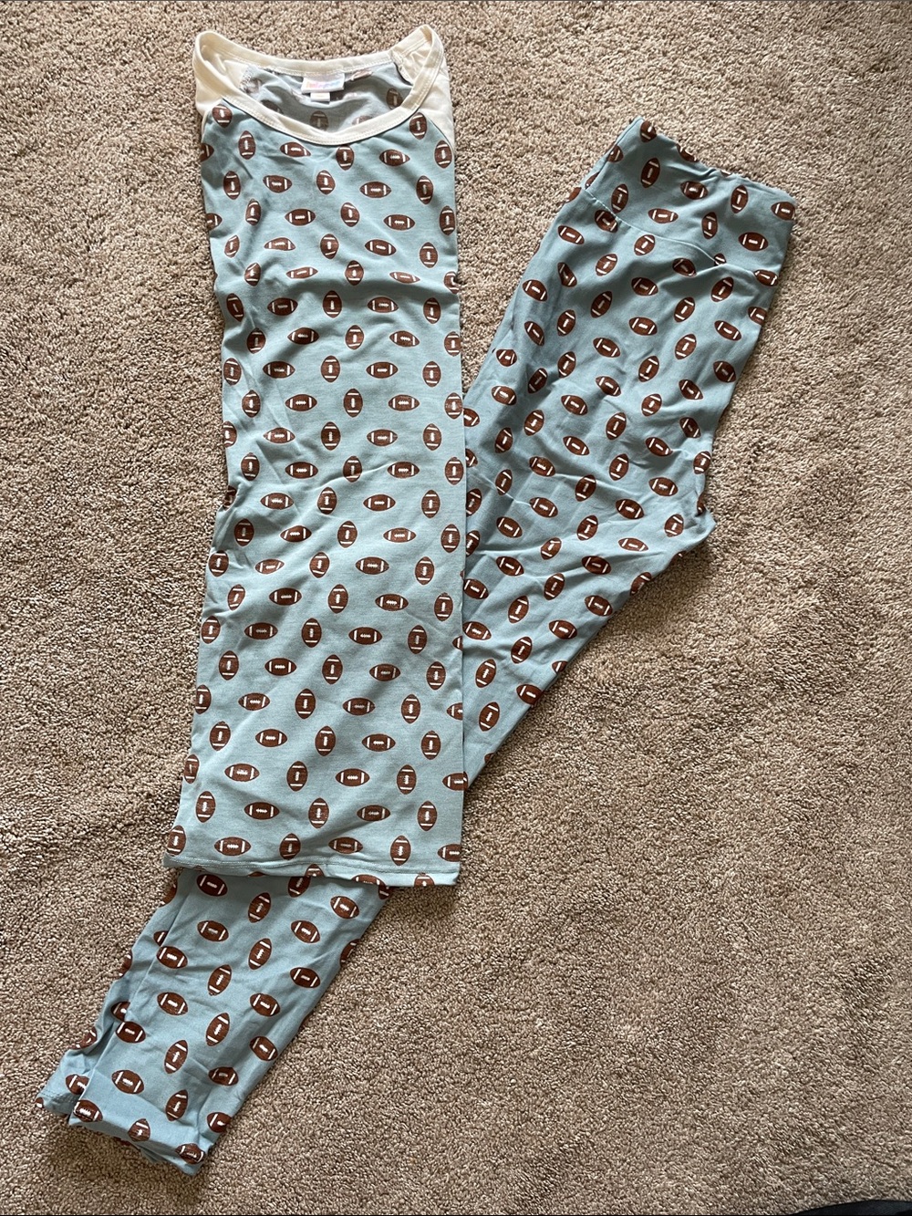 LuLaRoe light blue Randy top and TC Leggings with brown football print